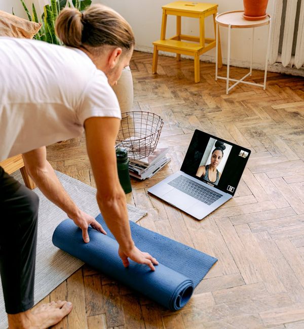 Person feeling energized and stretching after a yoga session.
